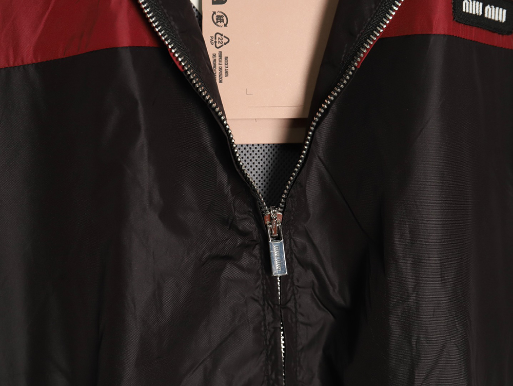 Miu Miu patchwork lettering trench coat