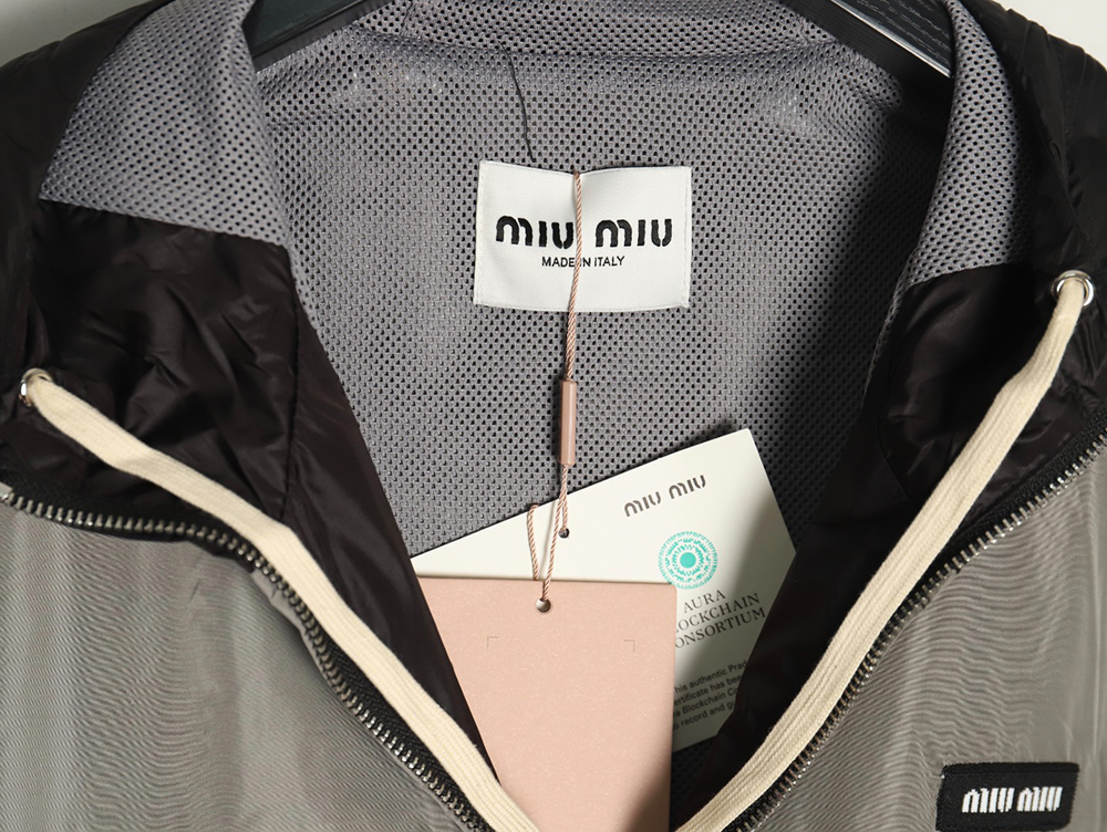 Miu Miu patchwork lettering trench coat TSK1