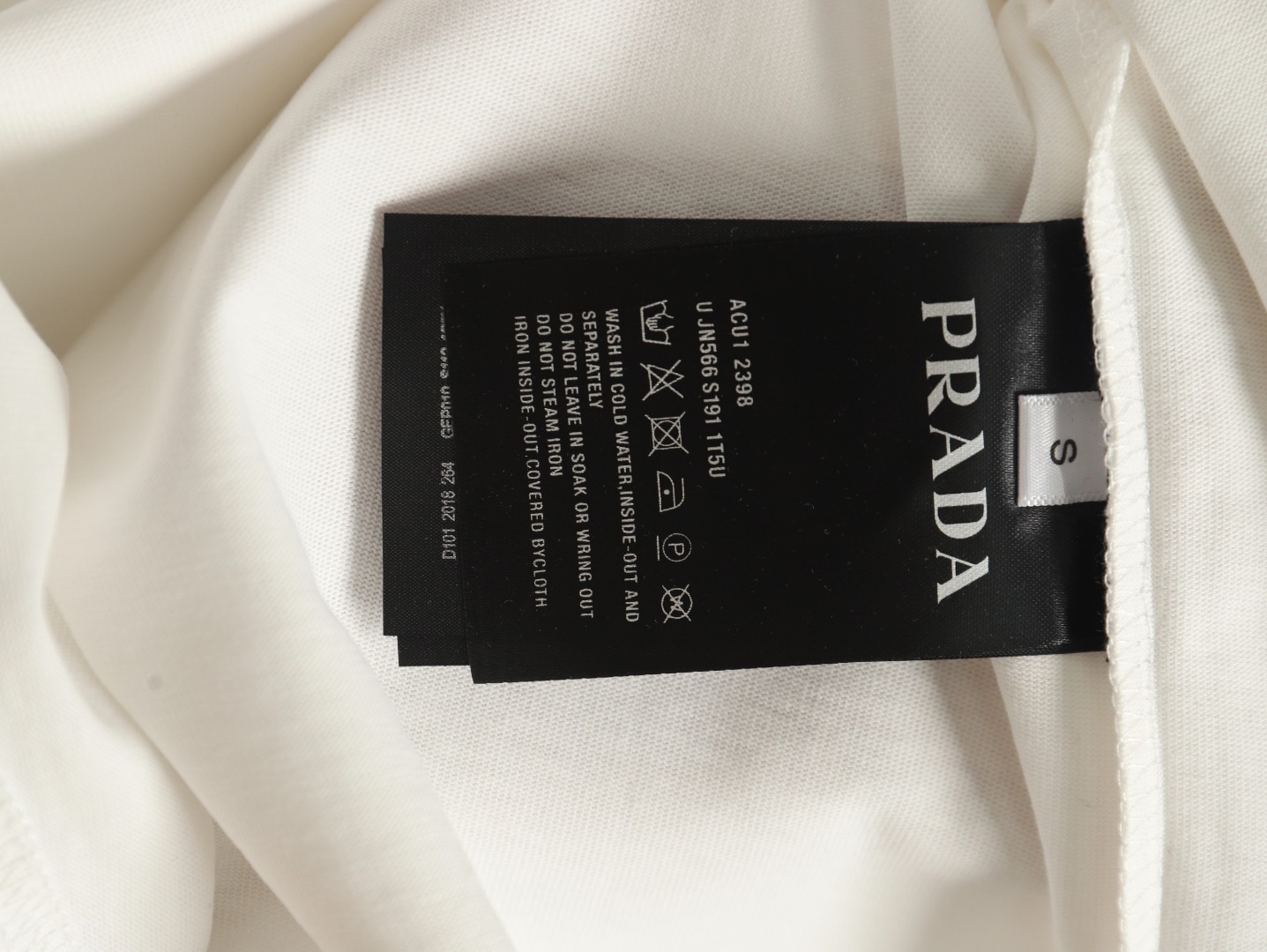 Prada triangle logo leather tag pocket short sleeves