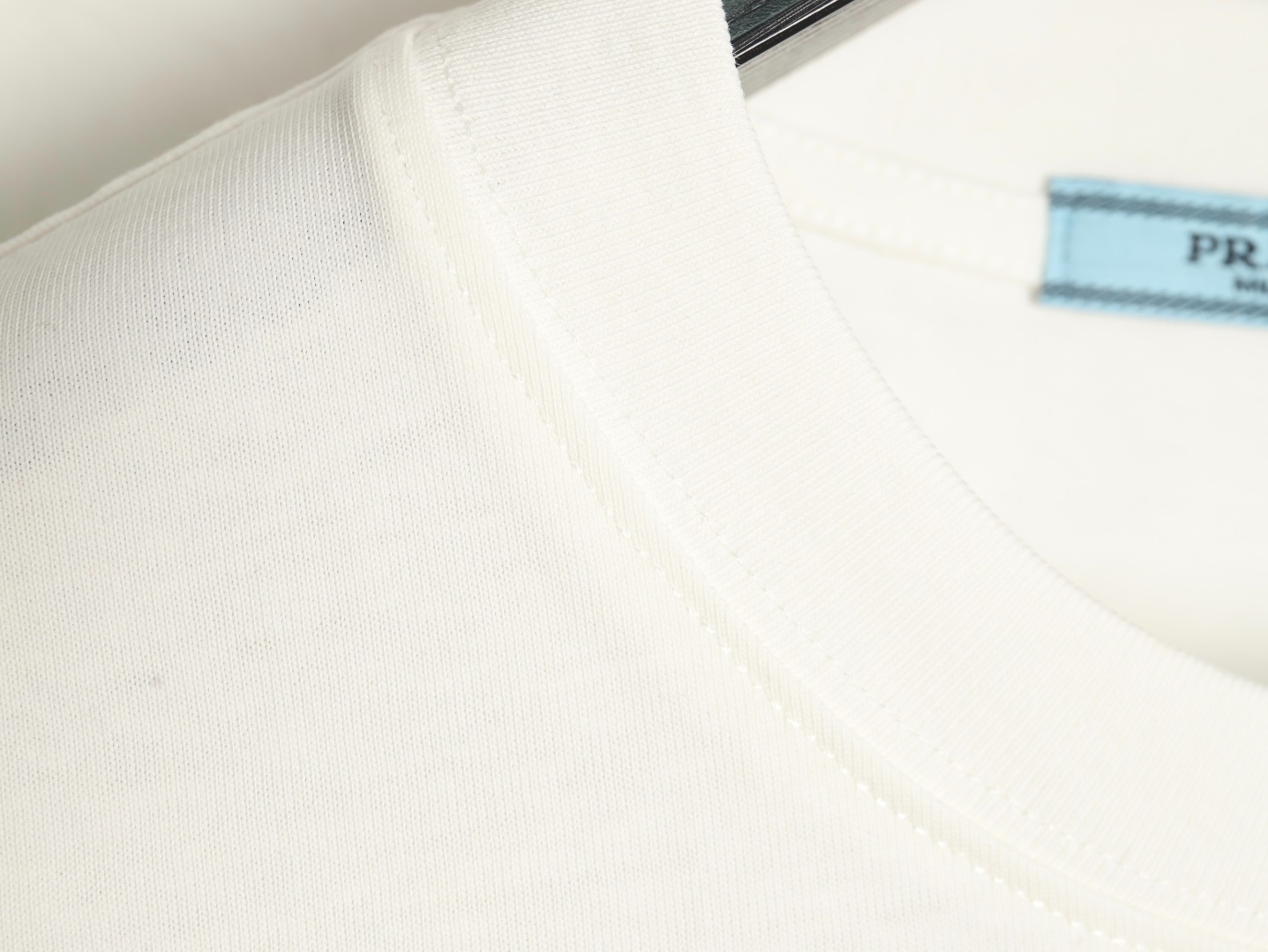 Prada triangle logo leather tag pocket short sleeves