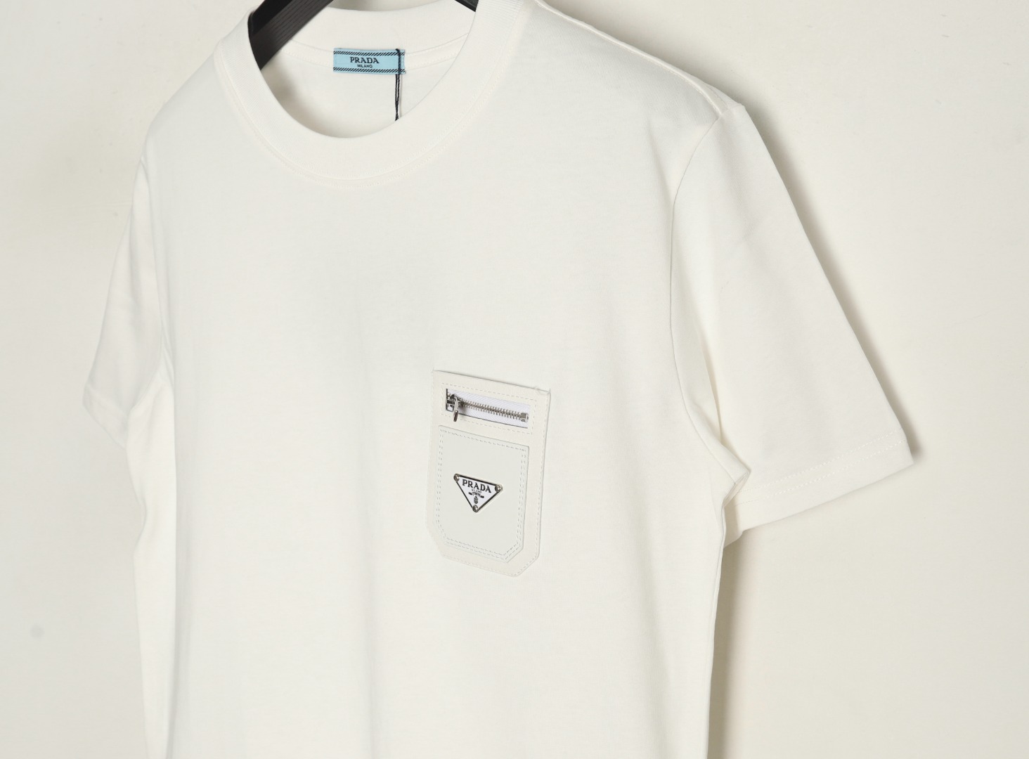 Prada triangle logo leather tag pocket short sleeves