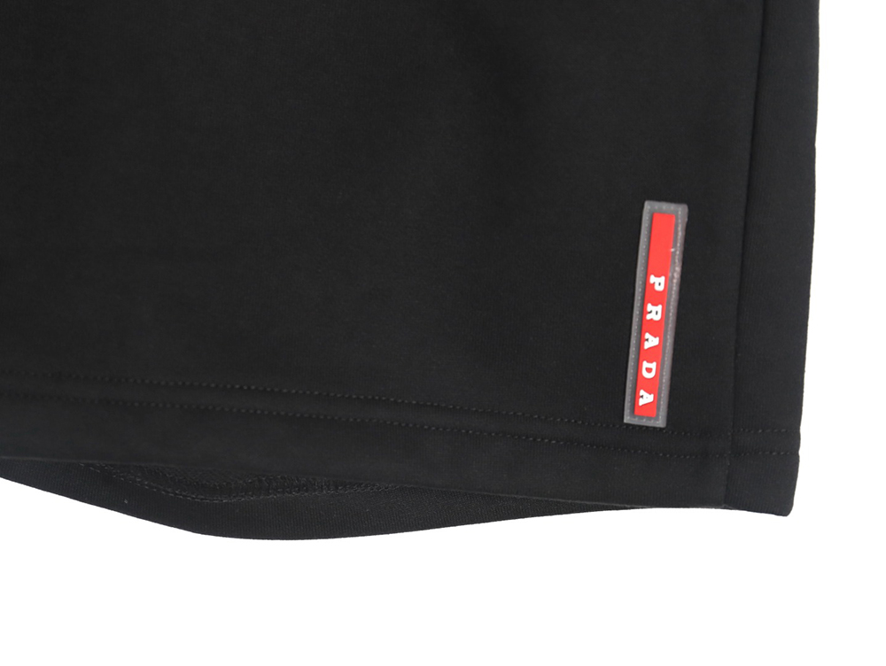 Prada triangle logo red rubber shorts