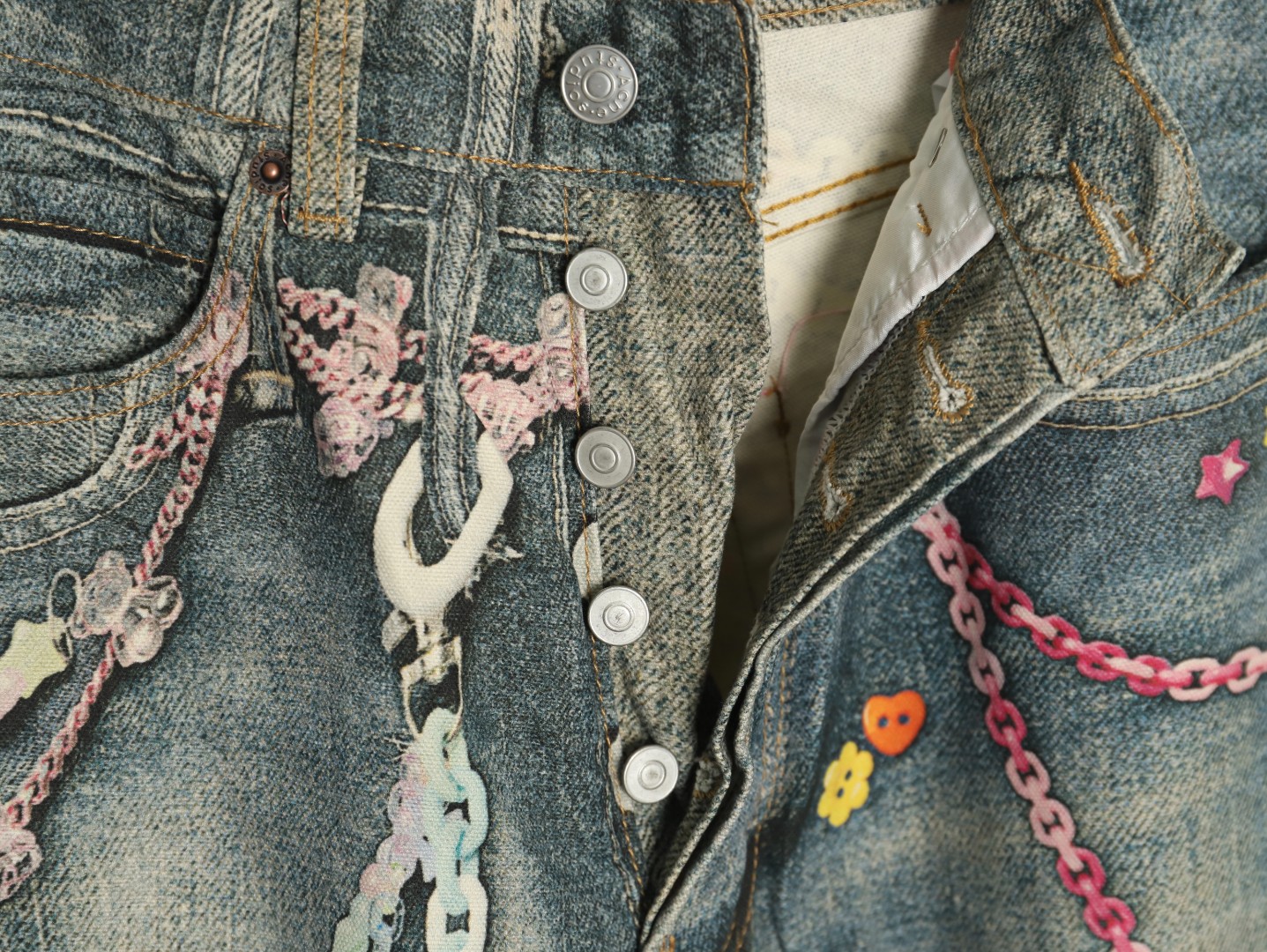 Acne Studios 1981M candy chain print denim trousers