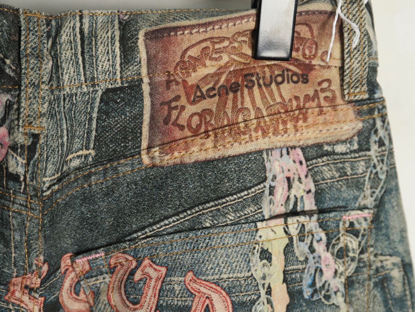 Acne Studios 1981M candy chain print denim trousers