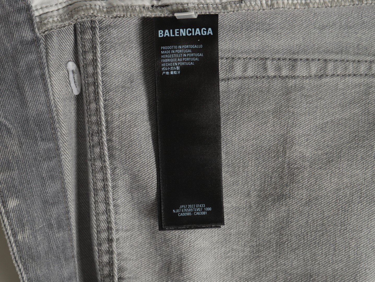 Balenciaga white waxed heavy jeans