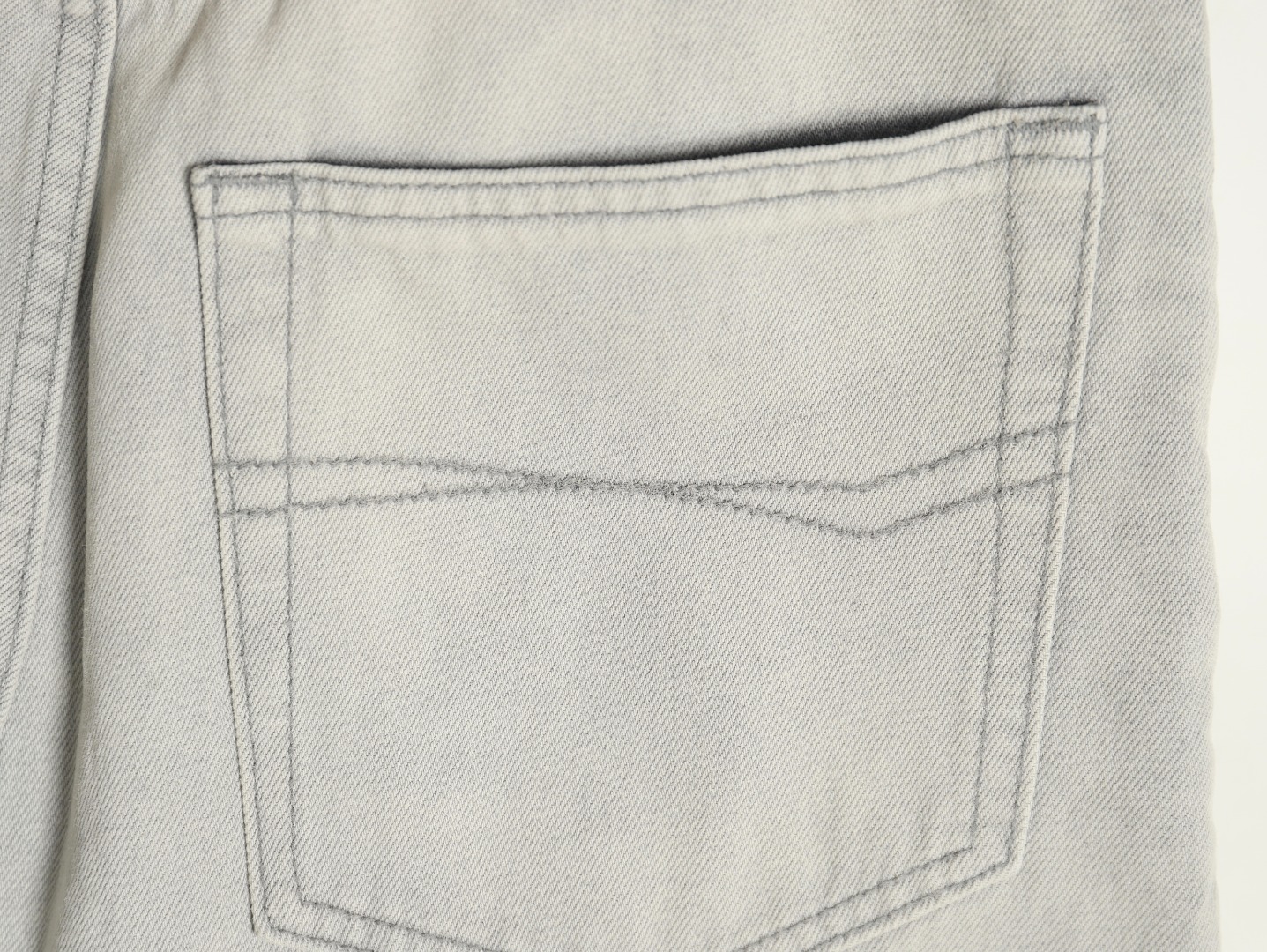 Balenciaga white waxed heavy jeans