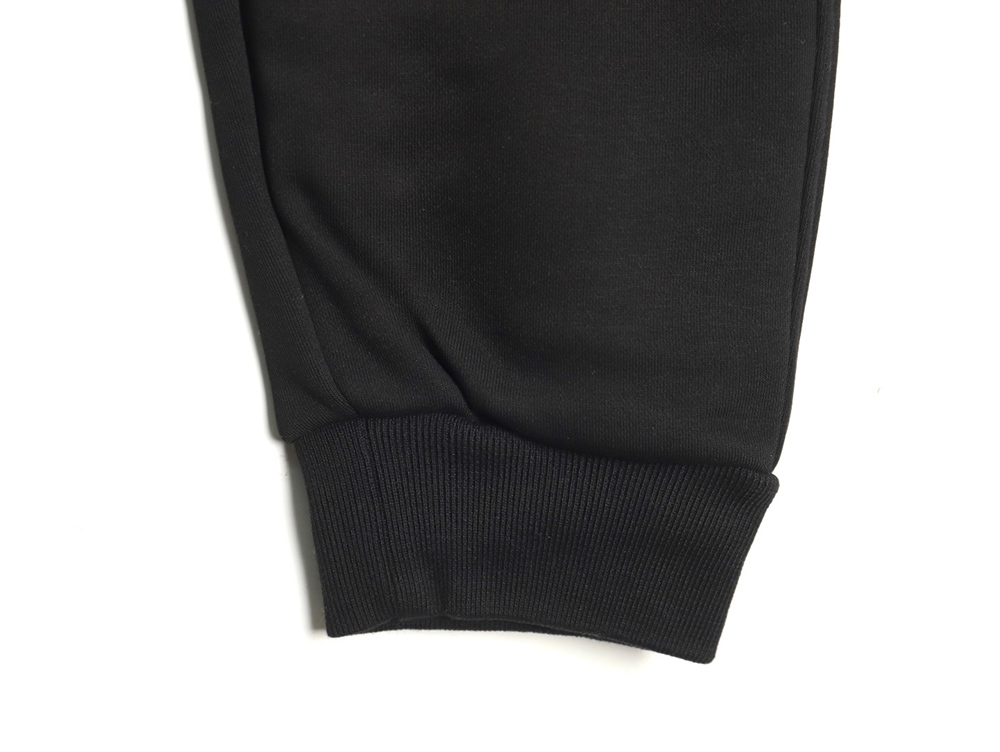 Loewe obscure logo embossed fleece trousers