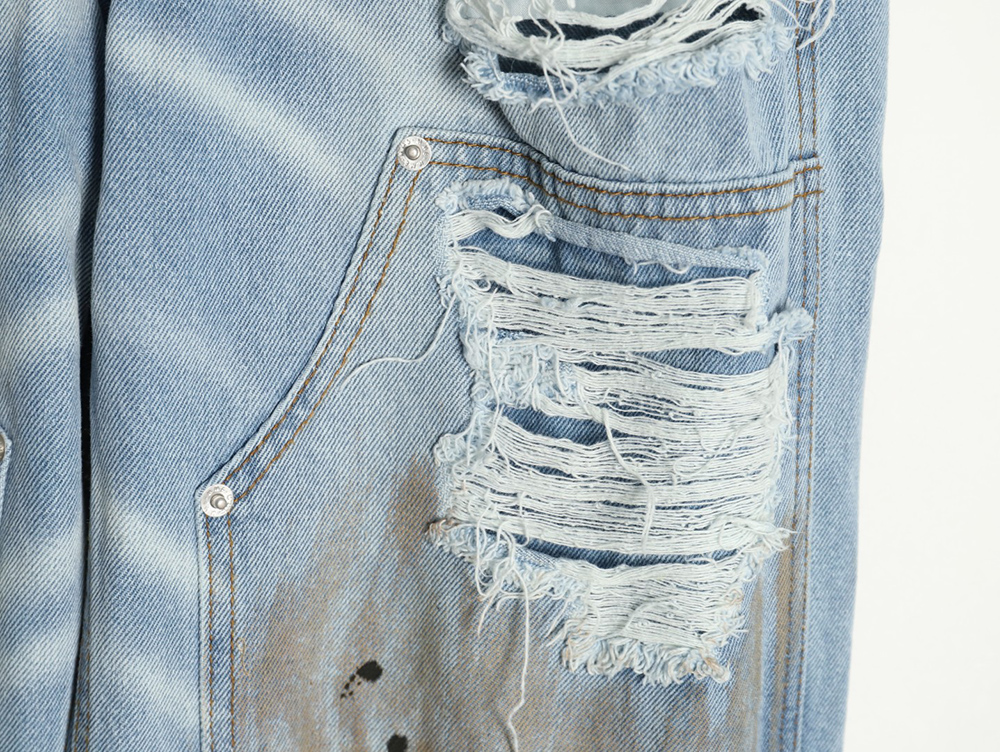 Maison Margiela distressed graffiti denim trousers