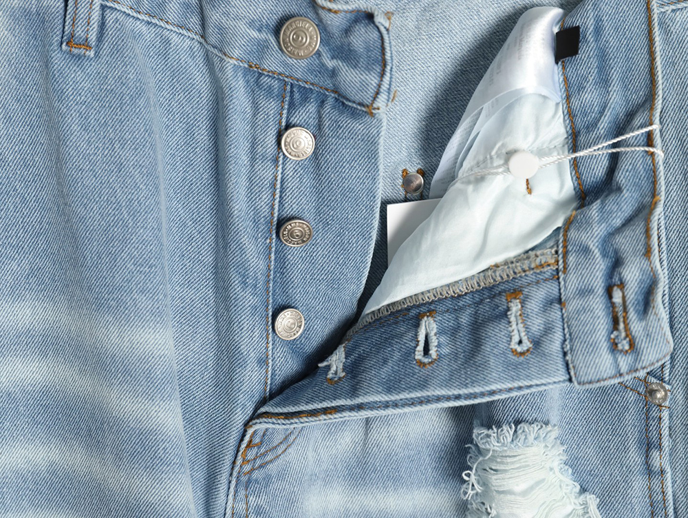 Maison Margiela distressed graffiti denim trousers