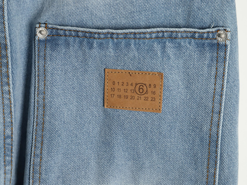 Maison Margiela distressed graffiti denim trousers